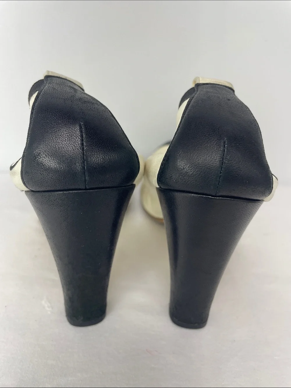 CHANEL Black & White Cap-Toe Leather Pumps